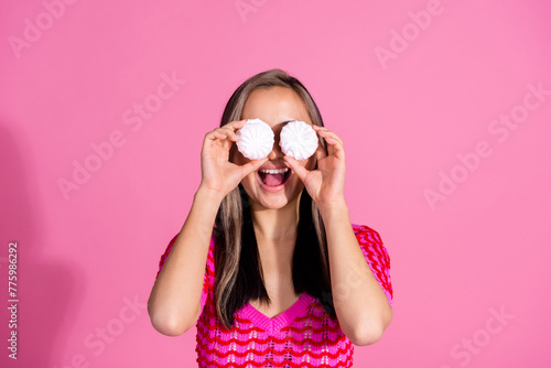 Photo of excited impressed lady dressed knitted shirt two marshmallows cover eyes isolated pink color background