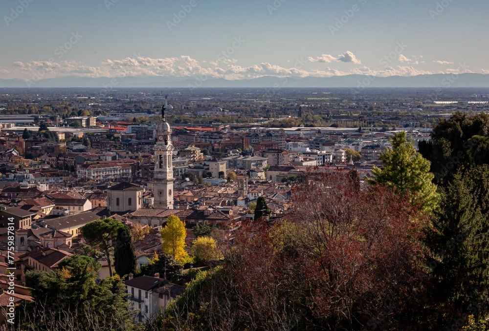 Landscape shot of the beautiful city of Bergamo, Italy, under the blue sky with clouds in distance