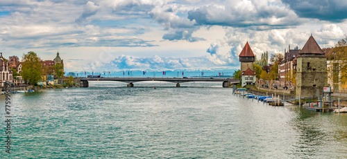 Large panorama of the Rhine Bridge (Rheinbrücke) at Constance with the two medieval towers Rheintorturm and Pulverturm. The bridge spans the Seerhein, a river in the basin of Lake Constance.
