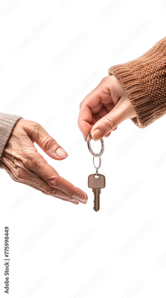 Obraz premium Old age woman giving key to young man, Key in the shape of house, giving responsibility, unique, real estate