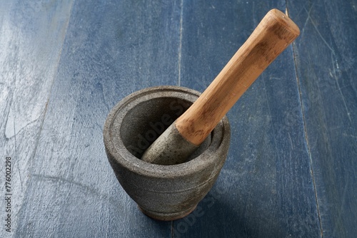 Stone and wood cooking utensil used to grind spices