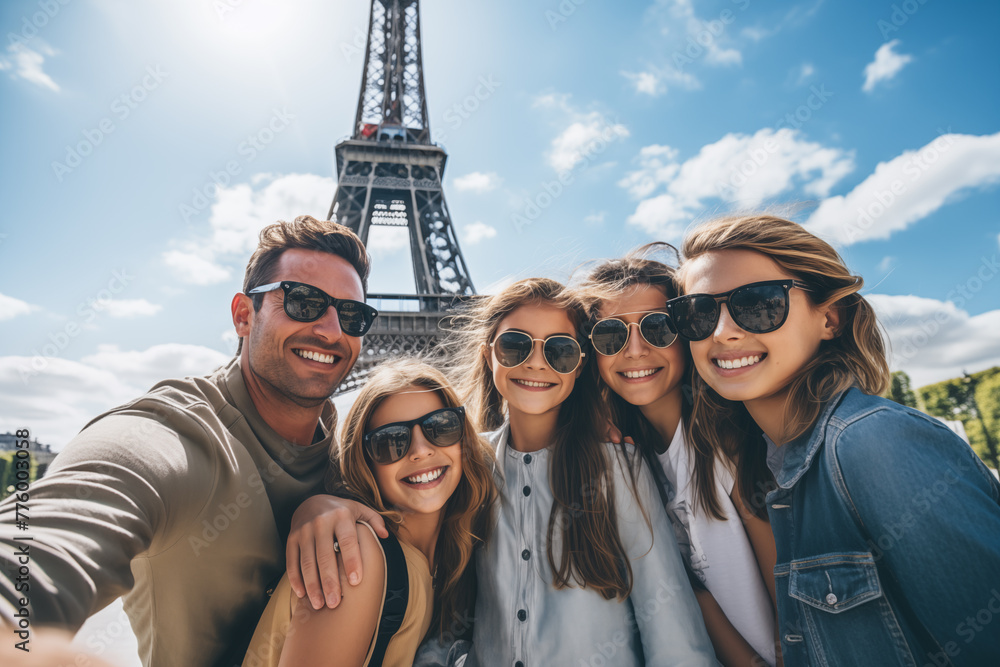 A family posing for a selfie in front of a famous landmark, creating lasting memories of their adventure together in a new and exciting destination A family posing for a selfie in front of a famous landmark, creating lasting memories of their adventure together in a new and exciting destination