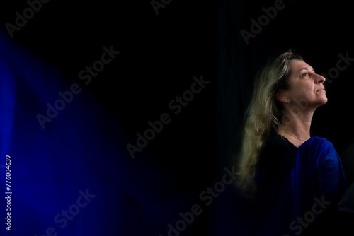 Long exposure shot of the woman with blue rag