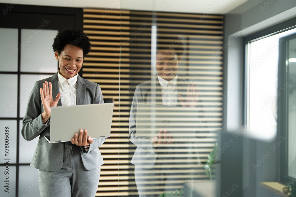 Afro businesswoman have video call at laptop
Afro businesswoman have video call at laptop