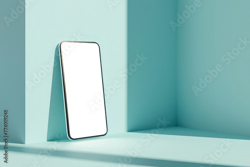 Smartphone with a blank screen propped in a light blue niche with subtle shadows. Mobile mockup scene