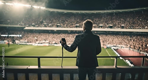 Journalist and commentator of football matches in the stadium. photo