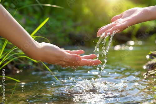 Fresh water flowing over hands symbolizes purity, life, conservation, hygiene and refreshment