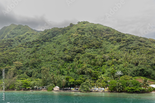 The lush South Pacific island of Mo'orea, French Polynesia, is seen from an approaching ferry.