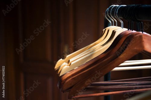 Fototapeta Empty hangers in wardrobe