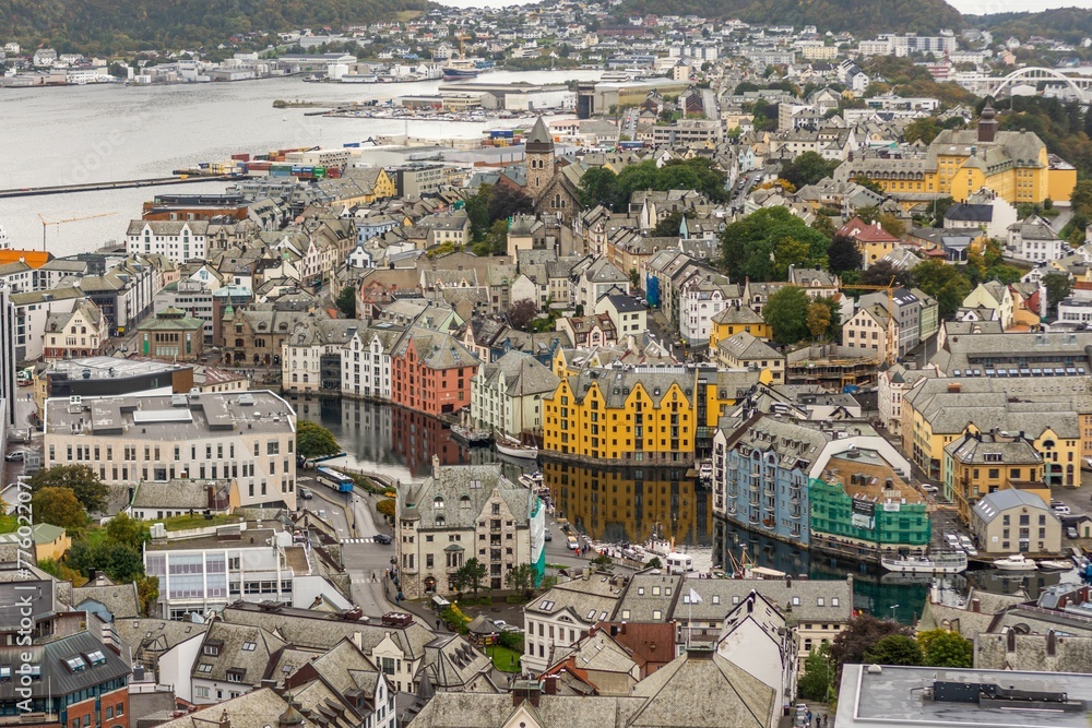 Aerial of the Alesund city with beautiful buildings surrounded by the North Sea during the daytime