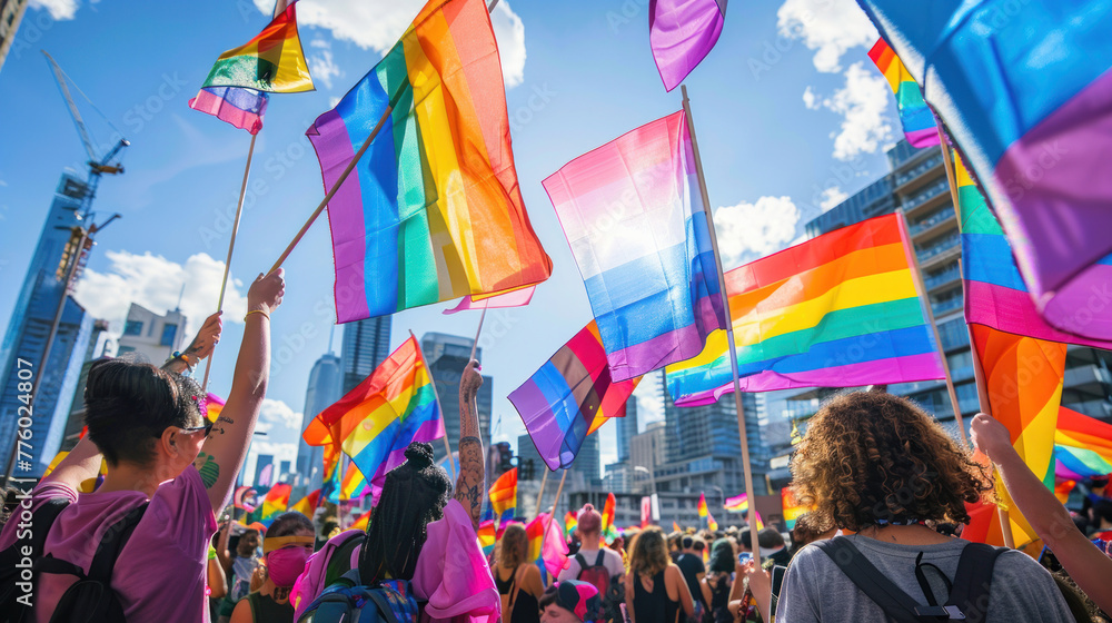 Rainbow flag as a symbol of tolerance and acceptance. LGBT communities at a pride parade in a European city. Human rights, equality, LGBT. Copy space Rainbow flag as a symbol of tolerance and acceptance. LGBT communities at a pride parade in a European city. Human rights, equality, LGBT. Copy space