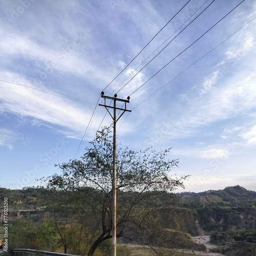 Landscape View of Dharamshala Hills Veley from Kangra with electrical wire Himachal Pradesh India 1 photo