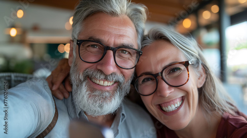 the man, distinguished with a gray beard, and the woman, sporting glasses, epitomize the spirit of today's active retirees who embrace life's joys with open arms. 
