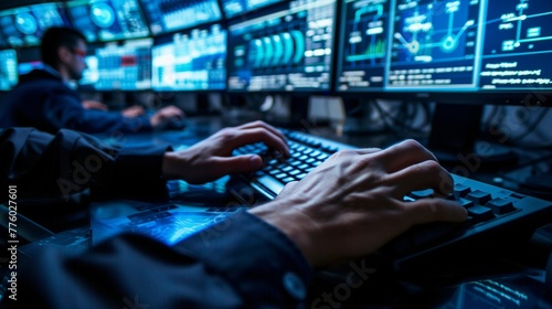 Close Up of a Professional Office Specialist Working on Desktop Computer in Modern Technological Monitoring Control Room with Digital Screens. Manager Typing on keyboard and Using Mouse