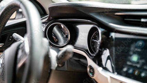 Closeup shot of the dashboard of a car © Wirestock