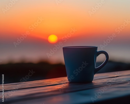 Silhouette of a Coffee Cup Enjoying a Peaceful Sunset Moment on an Outdoor Deck or Patio