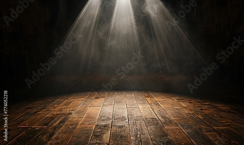 Wooden stage illuminated by spotlight against dark backdrop photo