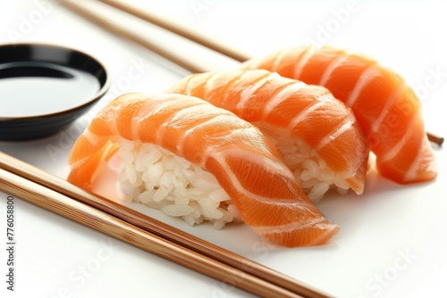 A bountiful feast of salmon sushi presented on a dark plate, a mix of rolls and nigiri to satisfy any sushi lover.
