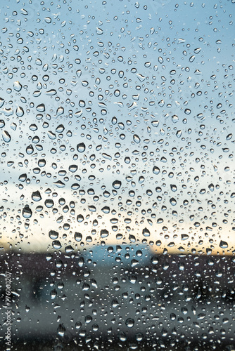 City window full of raindrops
