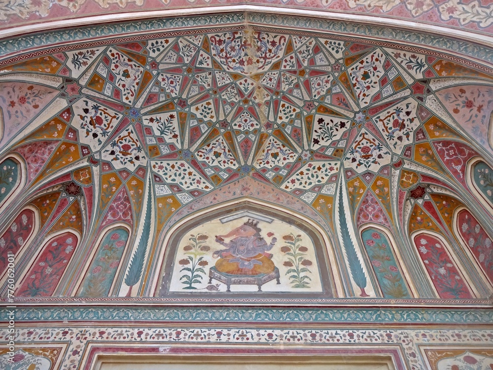 The highly Colorful and intricately painted Ganesh Pol Gate in Amber Fort ( Amer Fort ) Jaipur, Rajasthan, India 