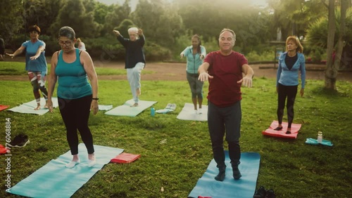 Senior people doing workout activity in a public park - Health elderly people lifestyle