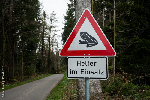 German is the sign of a frog "Help in action"