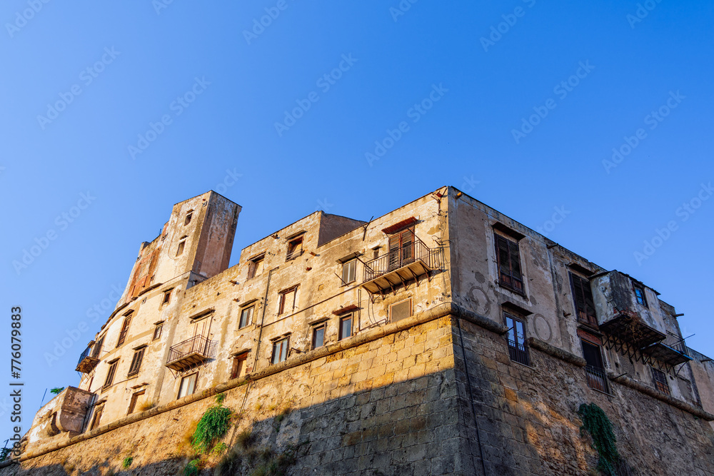 Historic Palermo building Palazzo Guccia with bastion facade in Sicily, Italy.
