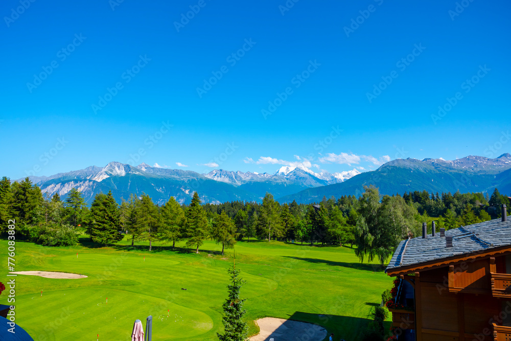 custom made wallpaper toronto digitalPanoramic View over Mountain with Snow and Weisshorn with 4505 Meters High and Golf Course with Clouds in Crans Montana, Valais in Switzerland.