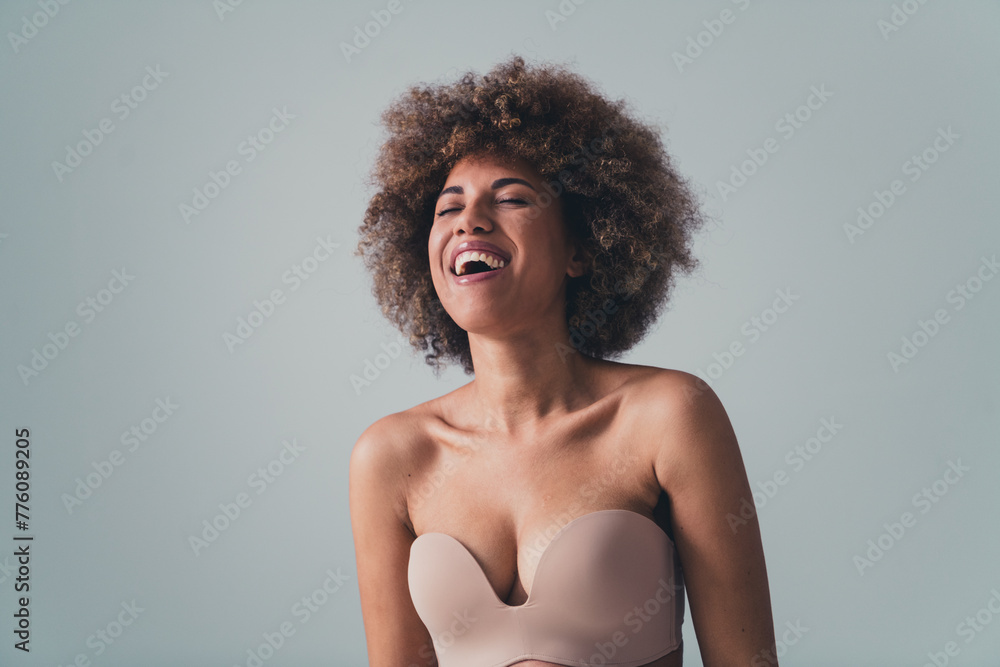 Unretouched photo of positive girl laughing wear super comfort bra advertising offer isolated over pastel color background Unretouched photo of positive girl laughing wear super comfort bra advertising offer isolated over pastel color background