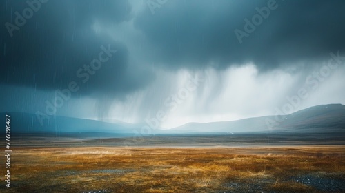 A stormy sky with a field of yellow grass