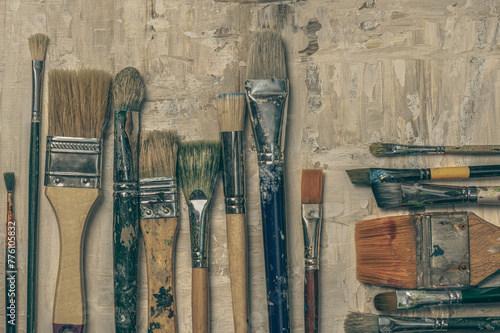 Row of vintage brushes for painting in retro style.Creativity concept.