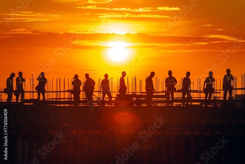 Captivating Ultra High Definition Image of a Golden Sunset Behind Silhouettes of Construction Workers, Paying Homage to Labour Achievements on International Labour