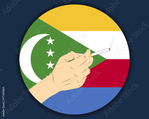 Holding a cigarette with Comoros flag, smoking and addiction idea