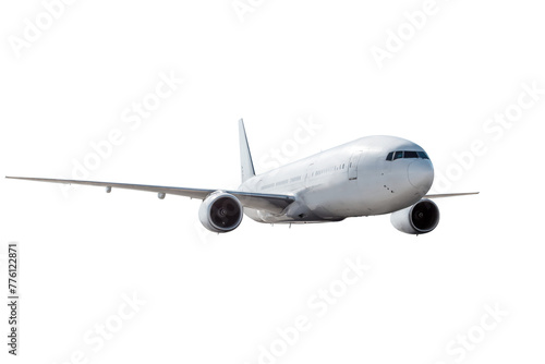 White wide body passenger aircraft flying isolated