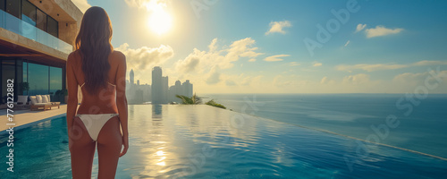 A woman stands poised in a luxury infinity pool with city background. Sunset Serenity at a Luxury Infinity Pool