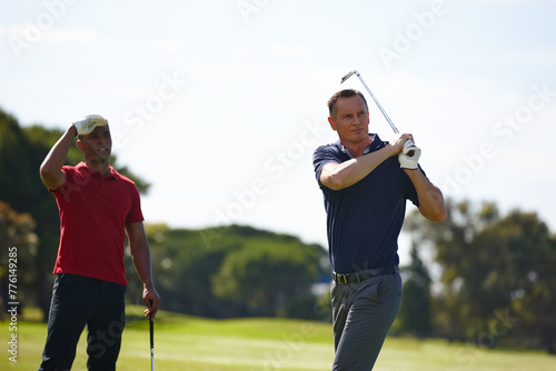 Men, sports and golf stroke outdoor for competition on green grass for training or exercise. People, athlete and golfer with club driver on lawn for professional contest or international match