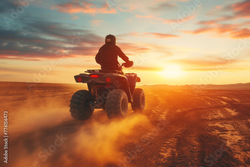 Man riding atv vehicle on offroad track, quad bike riders in the desert at sunset, extreme sport activities theme