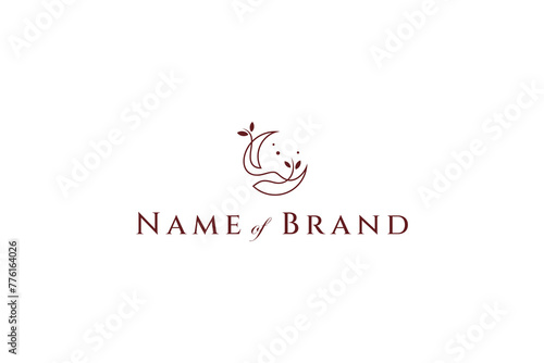 Abstract crescent moon logo with leaves