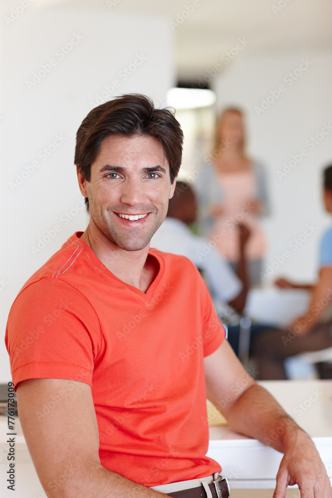Casual, businessman and smile in portrait at office with colleagues, working or job or happy. Male person, company and confidence with coworkers at desk for events management, planner or coordinator Casual, businessman and smile in portrait at office with colleagues, working or job or happy. Male person, company and confidence with coworkers at desk for events management, planner or coordinator