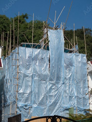 Hong Kong, scaffolding bamboo on house daylight