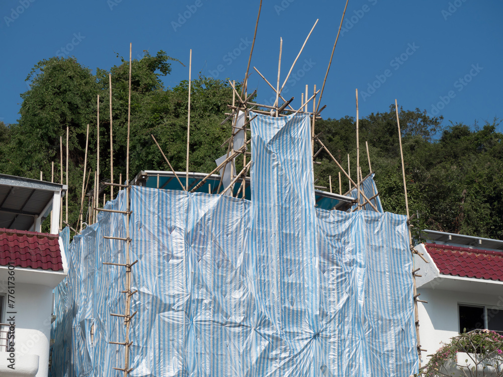 Hong Kong, scaffolding bamboo on house daylight