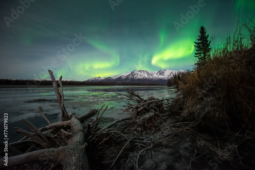 Northern lights in the sky over Alaska foreground