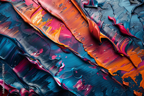 Close-up photo of colorful acrylic paint strokes creating an abstract, vibrant texture.