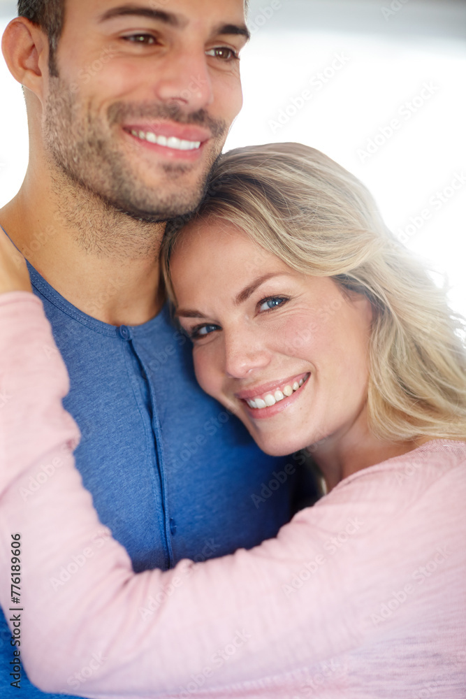 Couple, happy and embrace in portrait for love, relationship or memories together. Man, woman and romantic hug smile for dating, compassion or care in home cheerful for support, commitment and trust Couple, happy and embrace in portrait for love, relationship or memories together. Man, woman and romantic hug smile for dating, compassion or care in home cheerful for support, commitment and trust