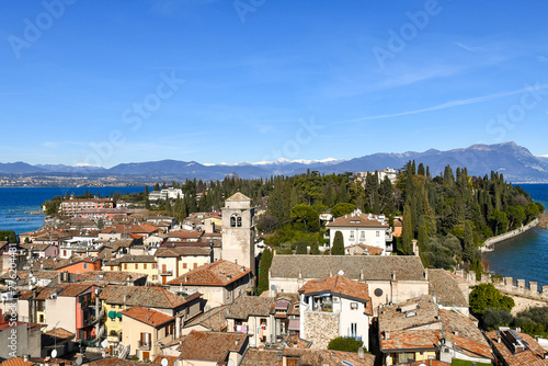 Elevated view of the peninsula of Sirmione, medieval village and famous holiday destination on Lake Garda, Sirmione, Brescia, Lombardy, Italy