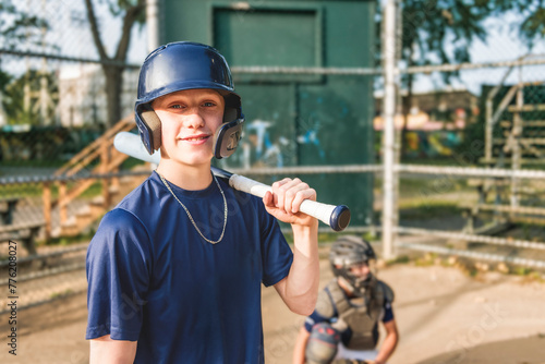 Photography Young teen boy play baseball on a playground