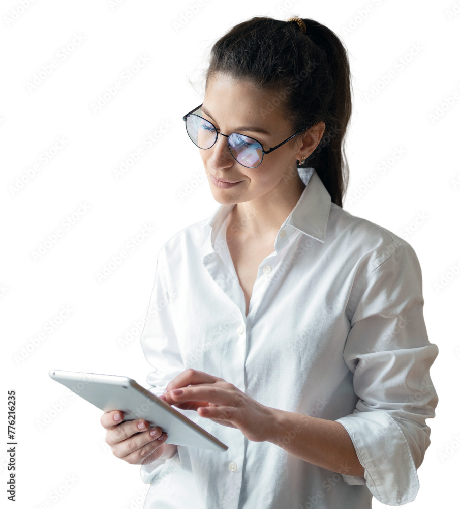 A woman in a shirt uses a tablet for online work. Isolated background. A woman in a shirt uses a tablet for online work. Isolated background.
