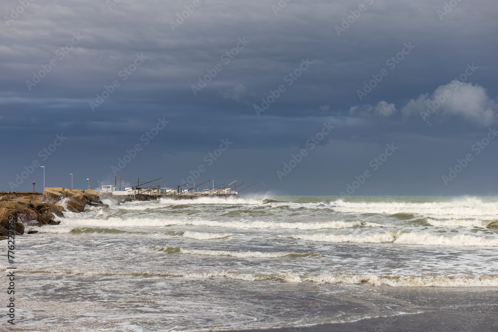 The Adriatic coast in Giulianova, Italy, during a storm surge.