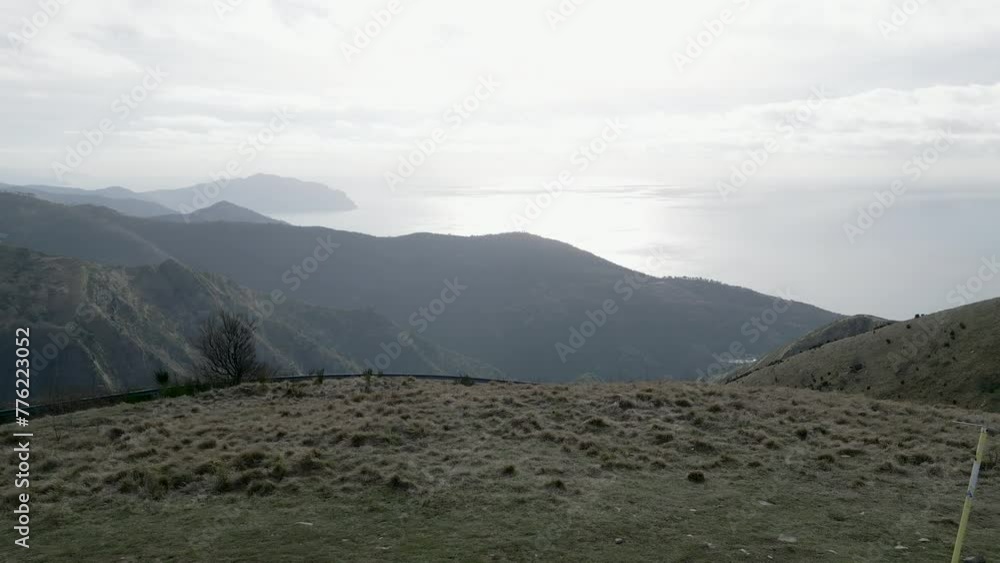 A motorbike on a muddy mountain road A motorbike on a muddy mountain road