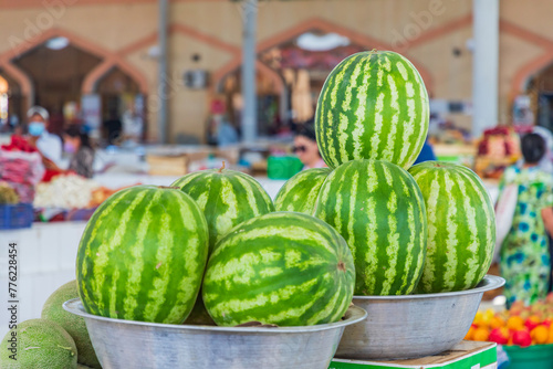 Fresh water melons for sale at a market in Bukhara.
